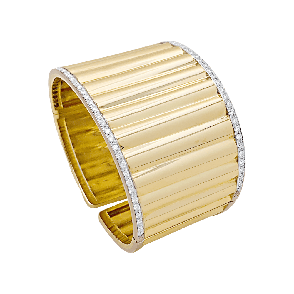 Bracelet manchette deux ors et diamants.