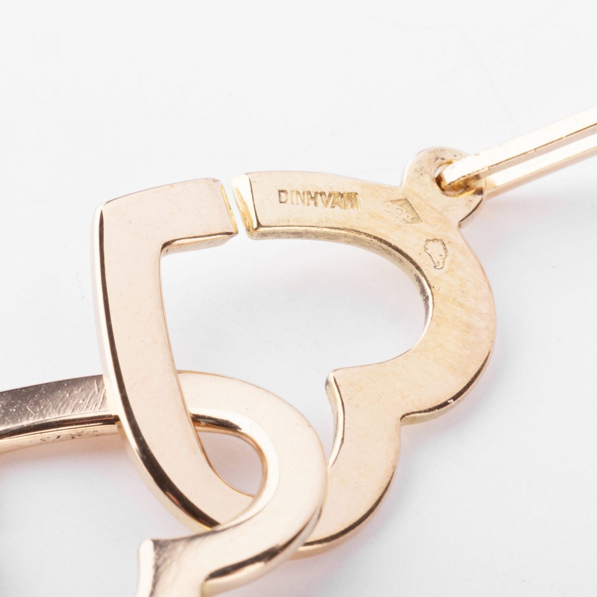 Dinh Van rose gold necklace forming 2 hearts
