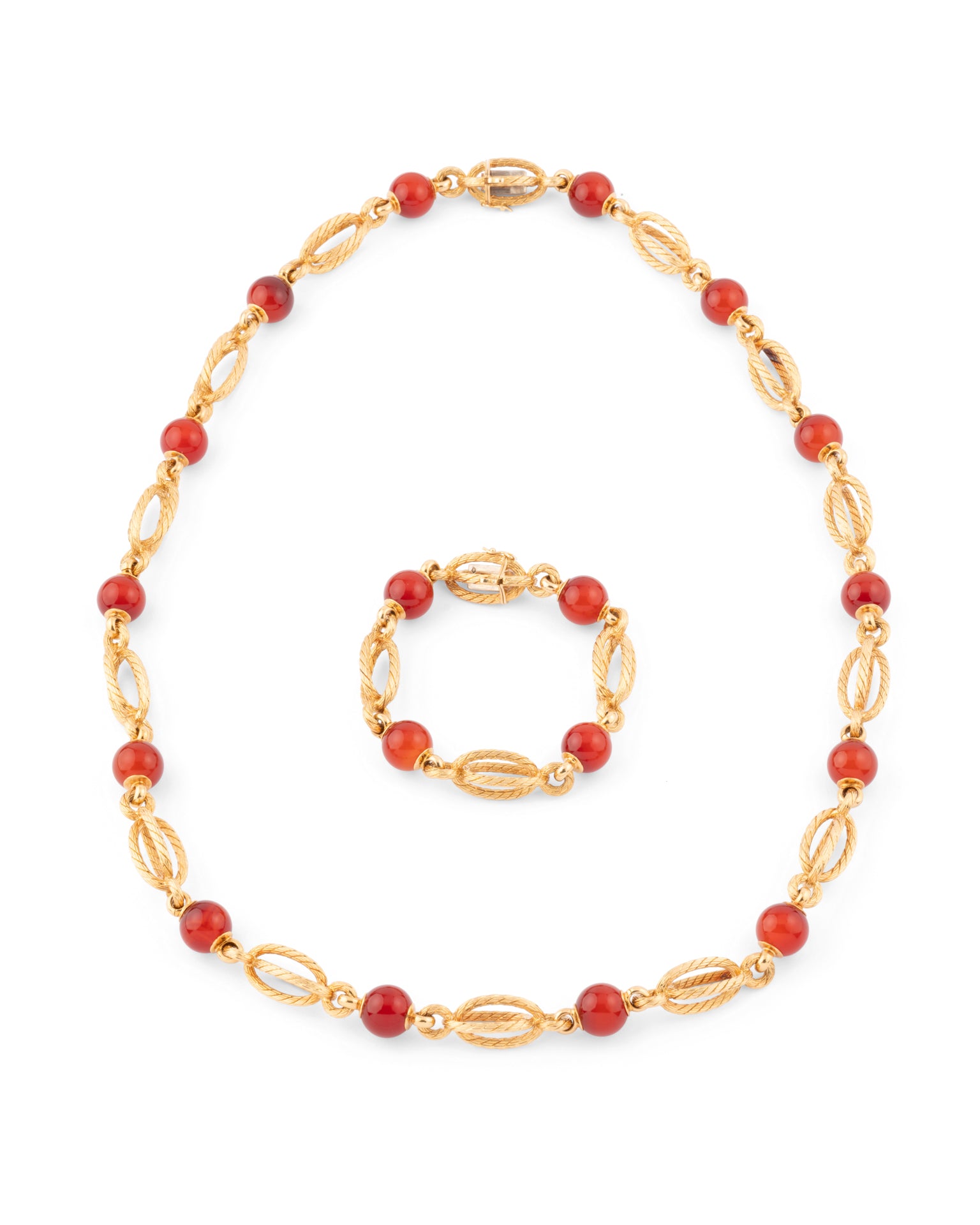 Aldebert, Collier Sautoir vintage transformable en or jaune 18K et cornaline
