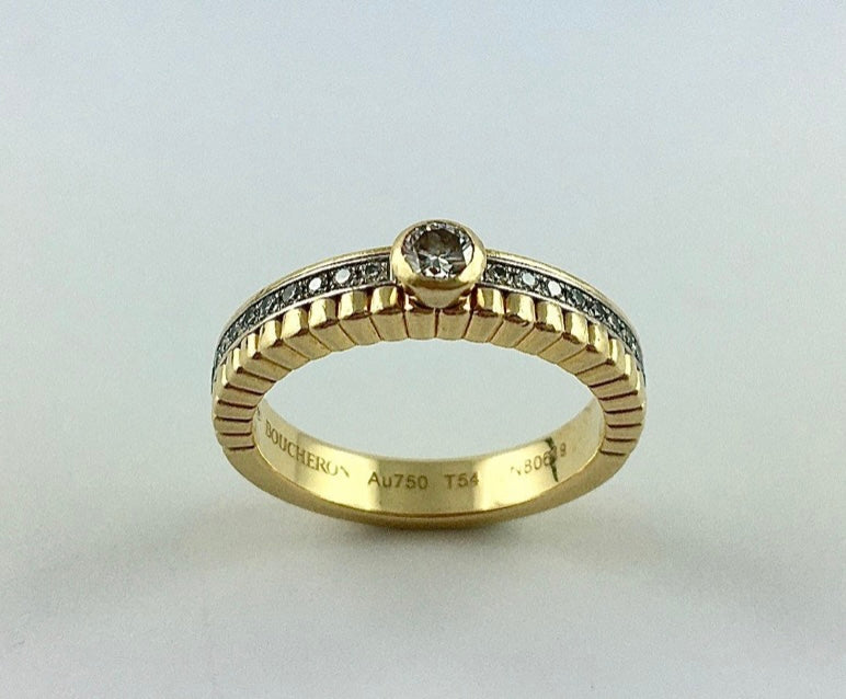 A "Quatre radiant" model ring in yellow gold from Boucheron