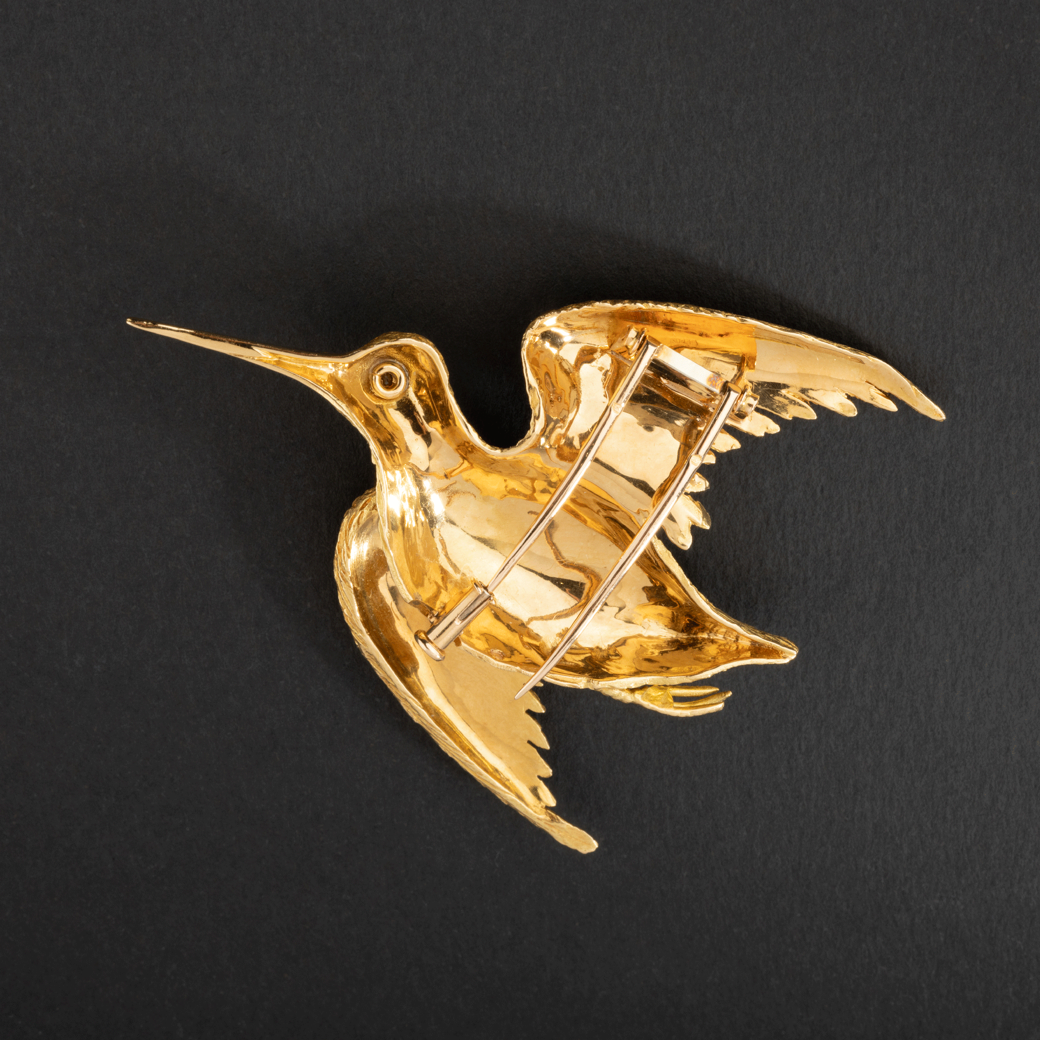 Broche oiseau en or jaune