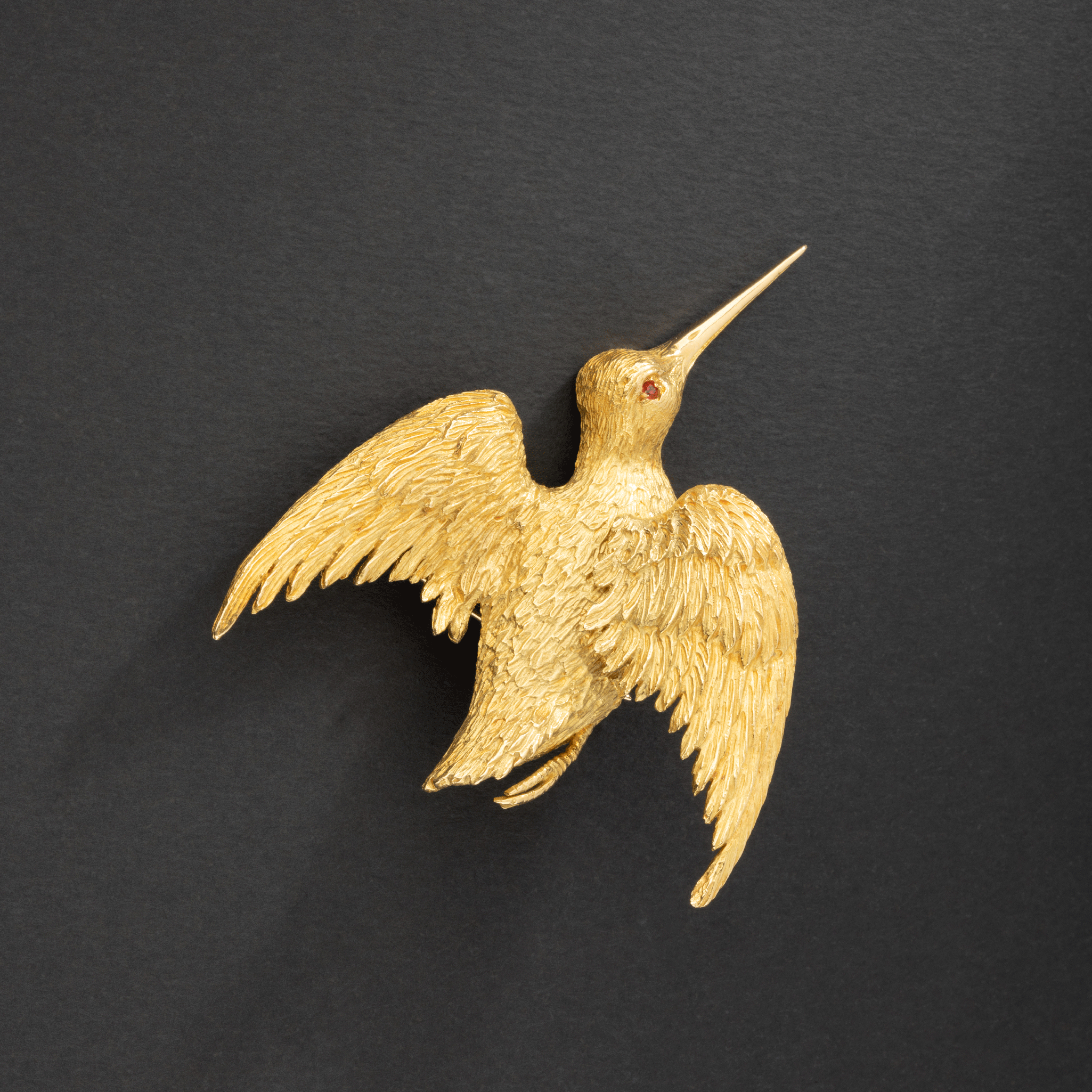Broche oiseau en or jaune