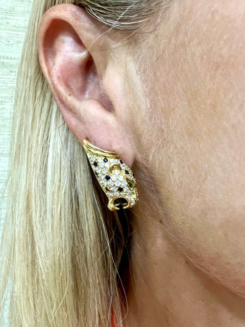 Gold, diamond, sapphire, and emerald earrings. GAY FRERES.