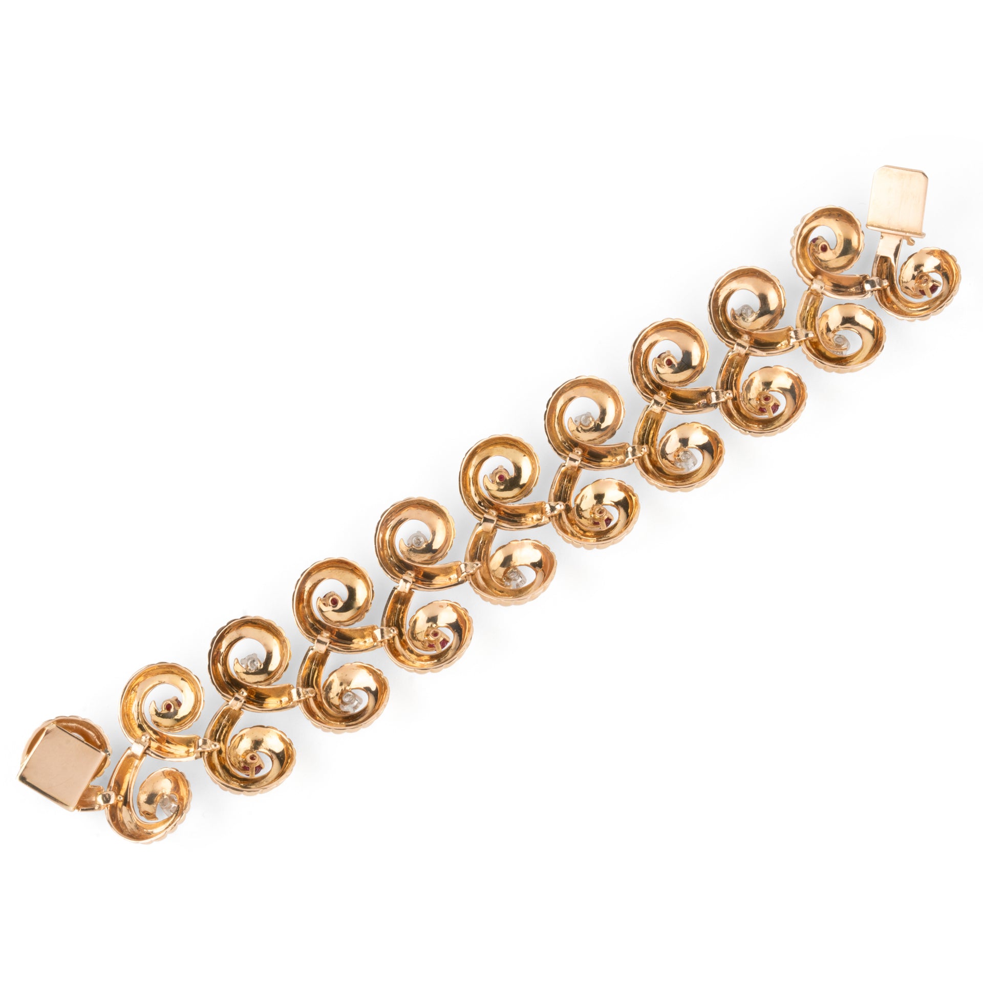 18K gold ruby and diamond bracelet with master's hallmark and eagle's head.