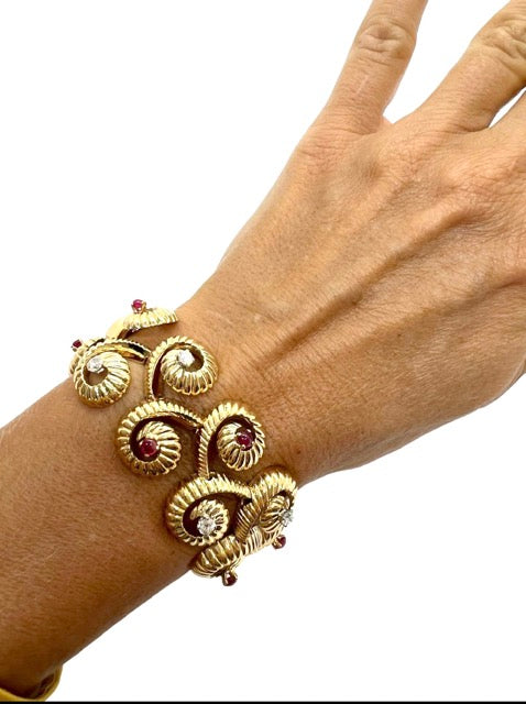 18K gold ruby and diamond bracelet with master's hallmark and eagle's head.