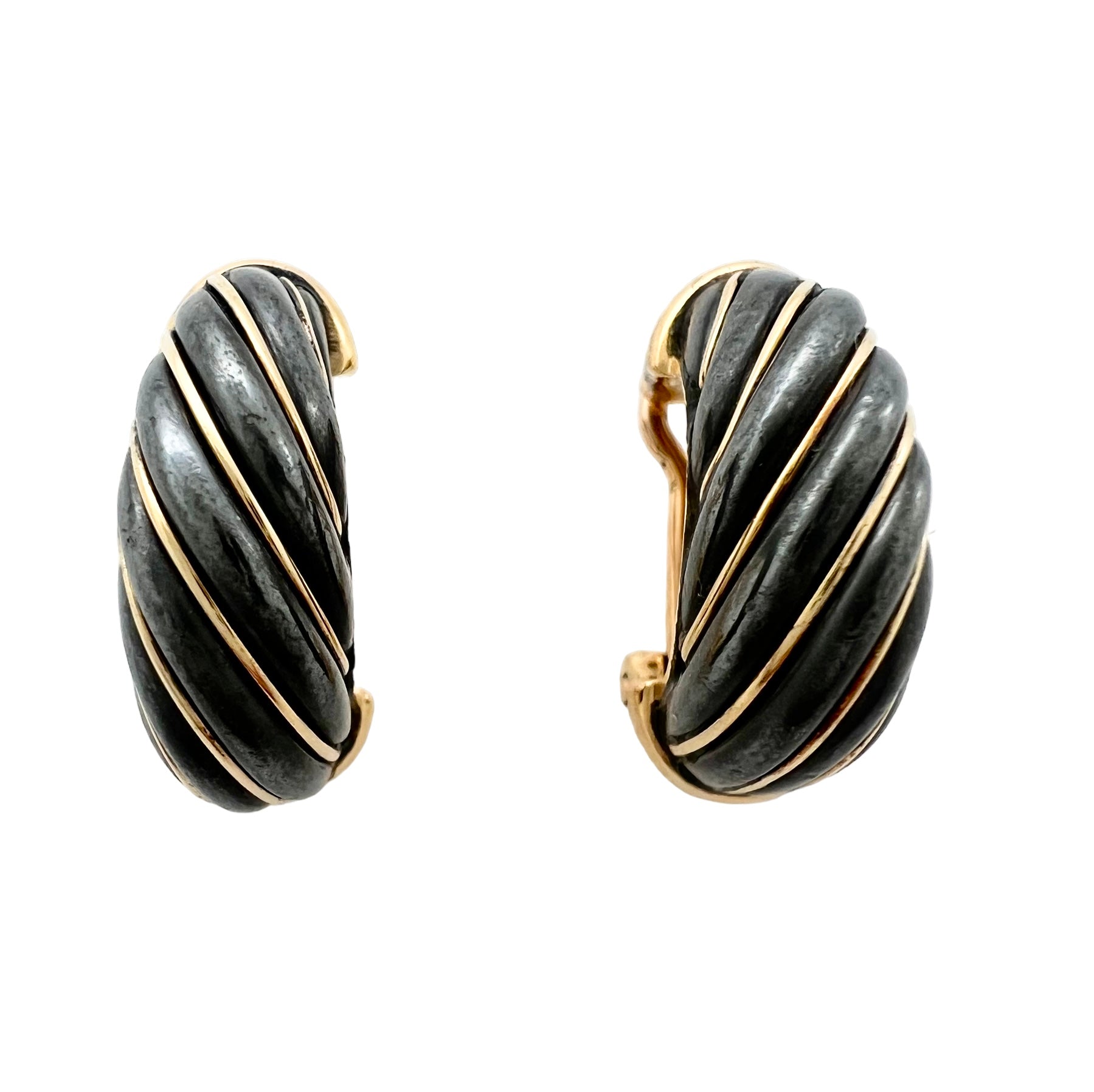 Cartier earrings in gold and oxidized silver in their case