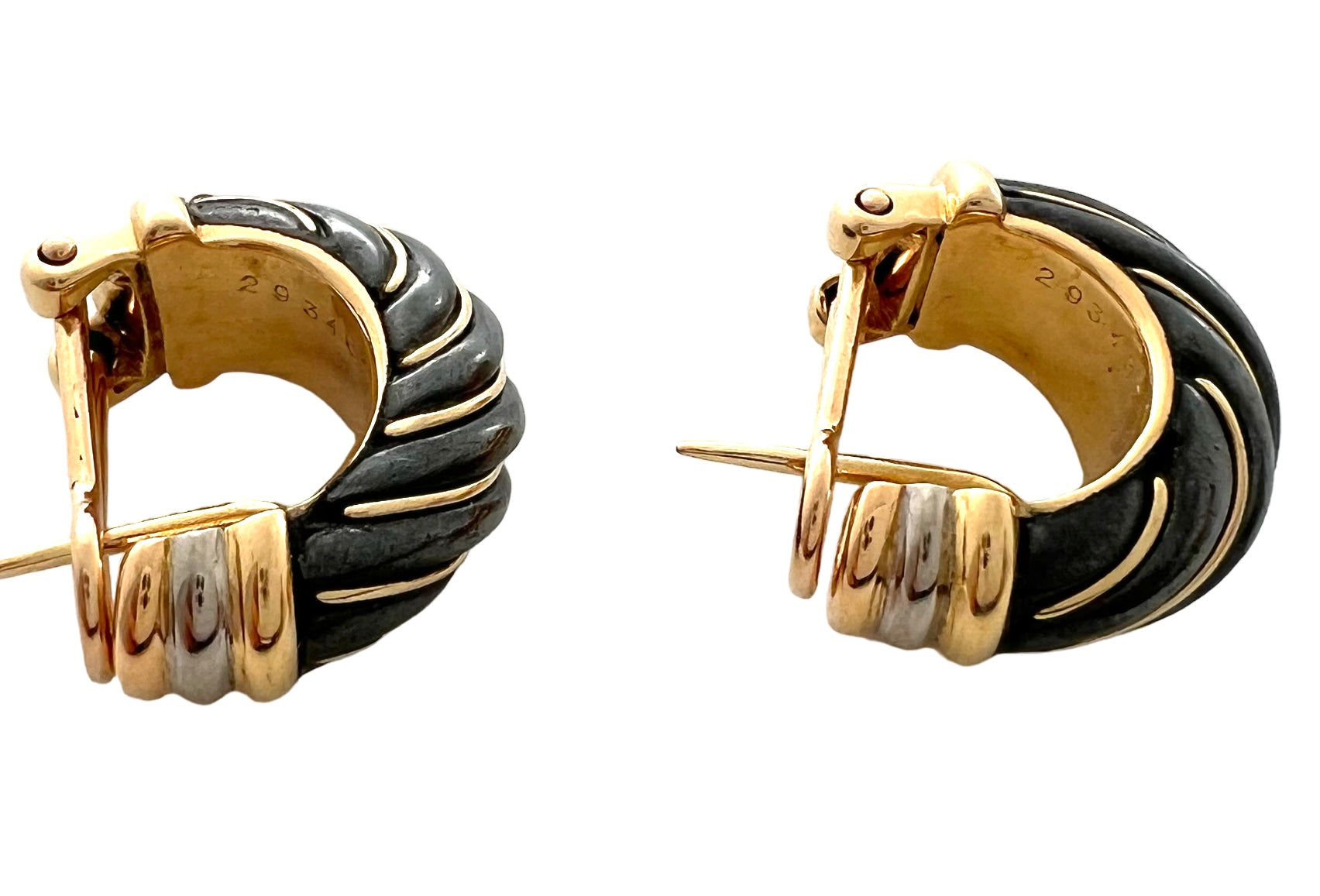 Cartier earrings in gold and oxidized silver in their case