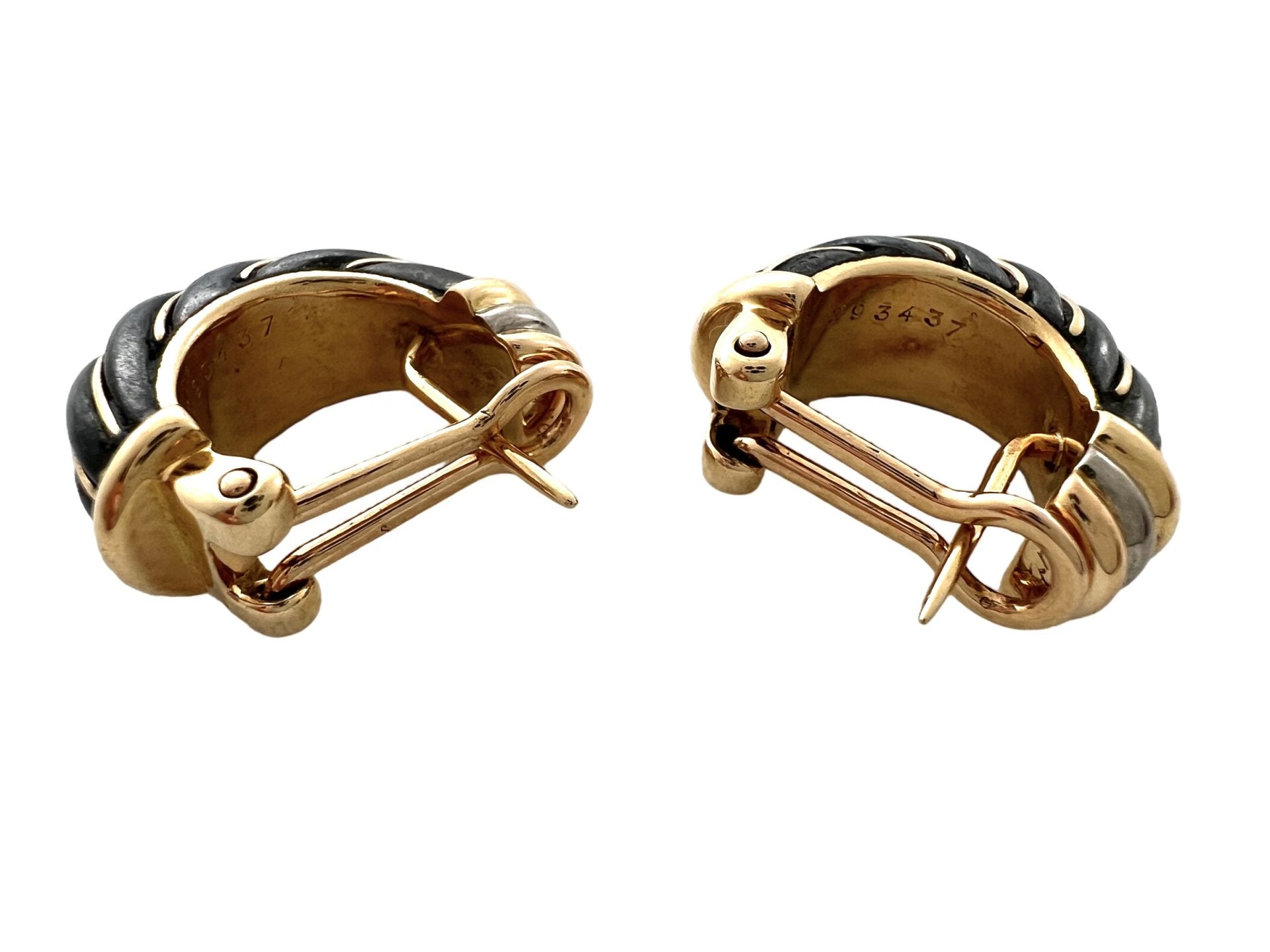 Cartier earrings in gold and oxidized silver in their case