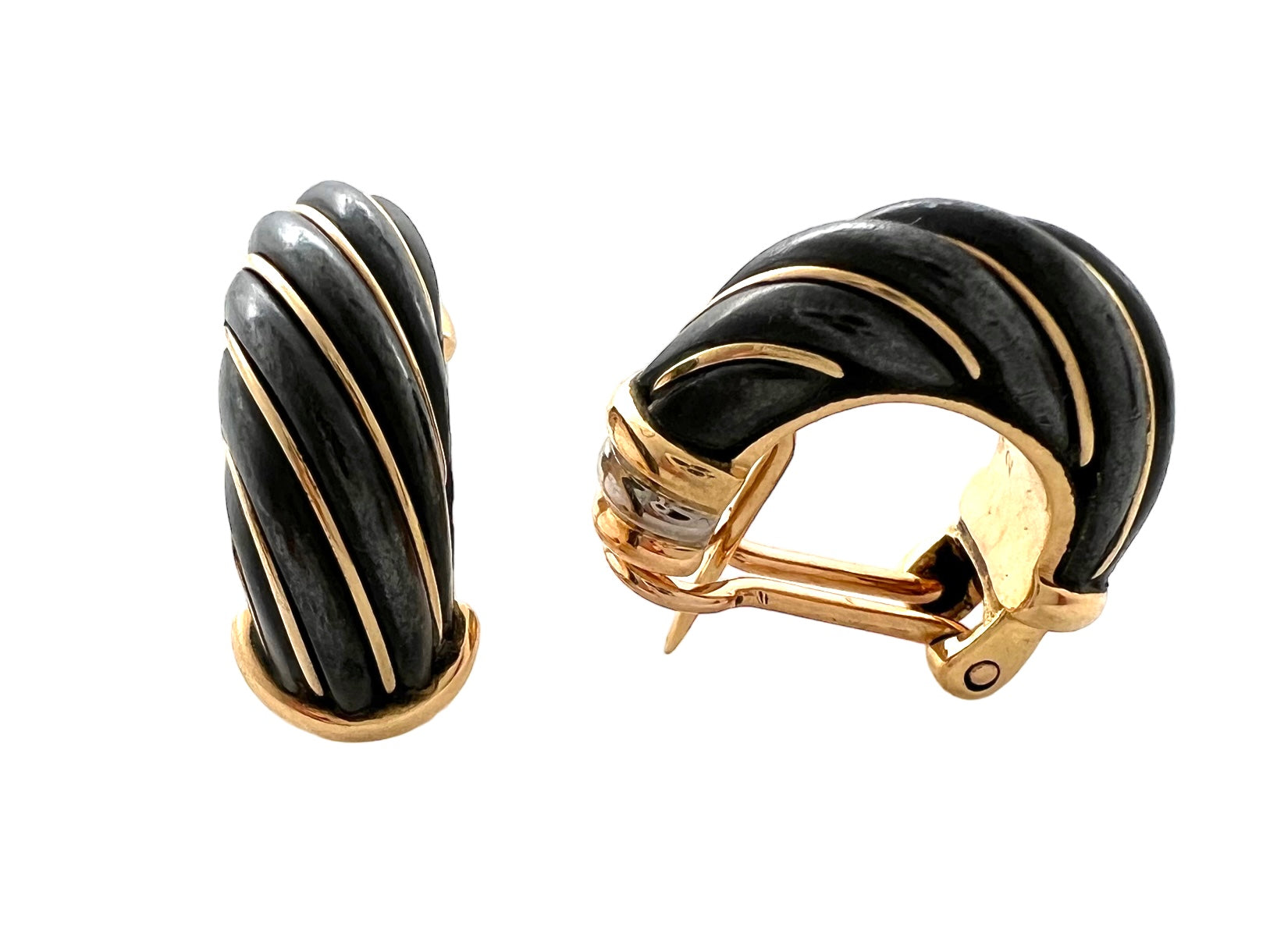 Cartier earrings in gold and oxidized silver in their case