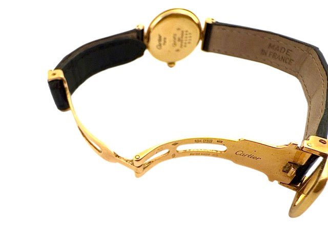 Cartier montre "Colisée" en or jaune sur bracelet crocodile noir vintage - Maison Eloe