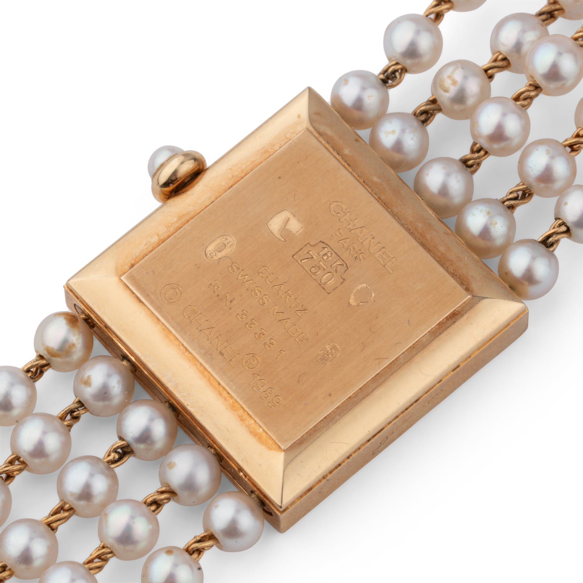 Chanel, vintage "Mademoiselle" watch in pearls on 18K yellow gold