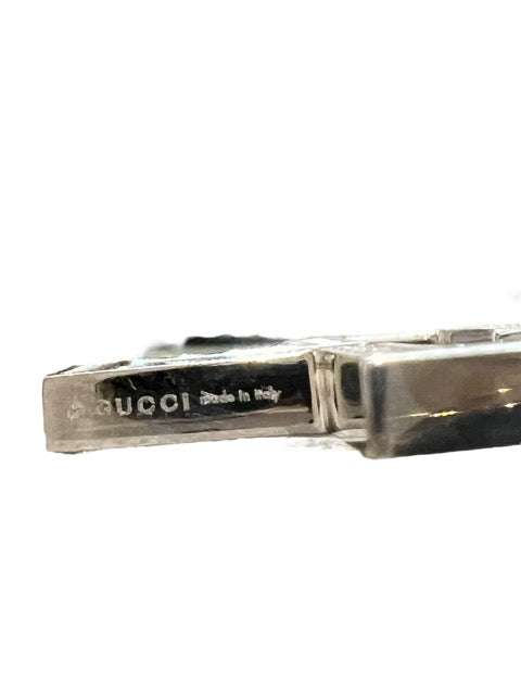 Gucci, Gold and diamond cross pendant on black satin strap