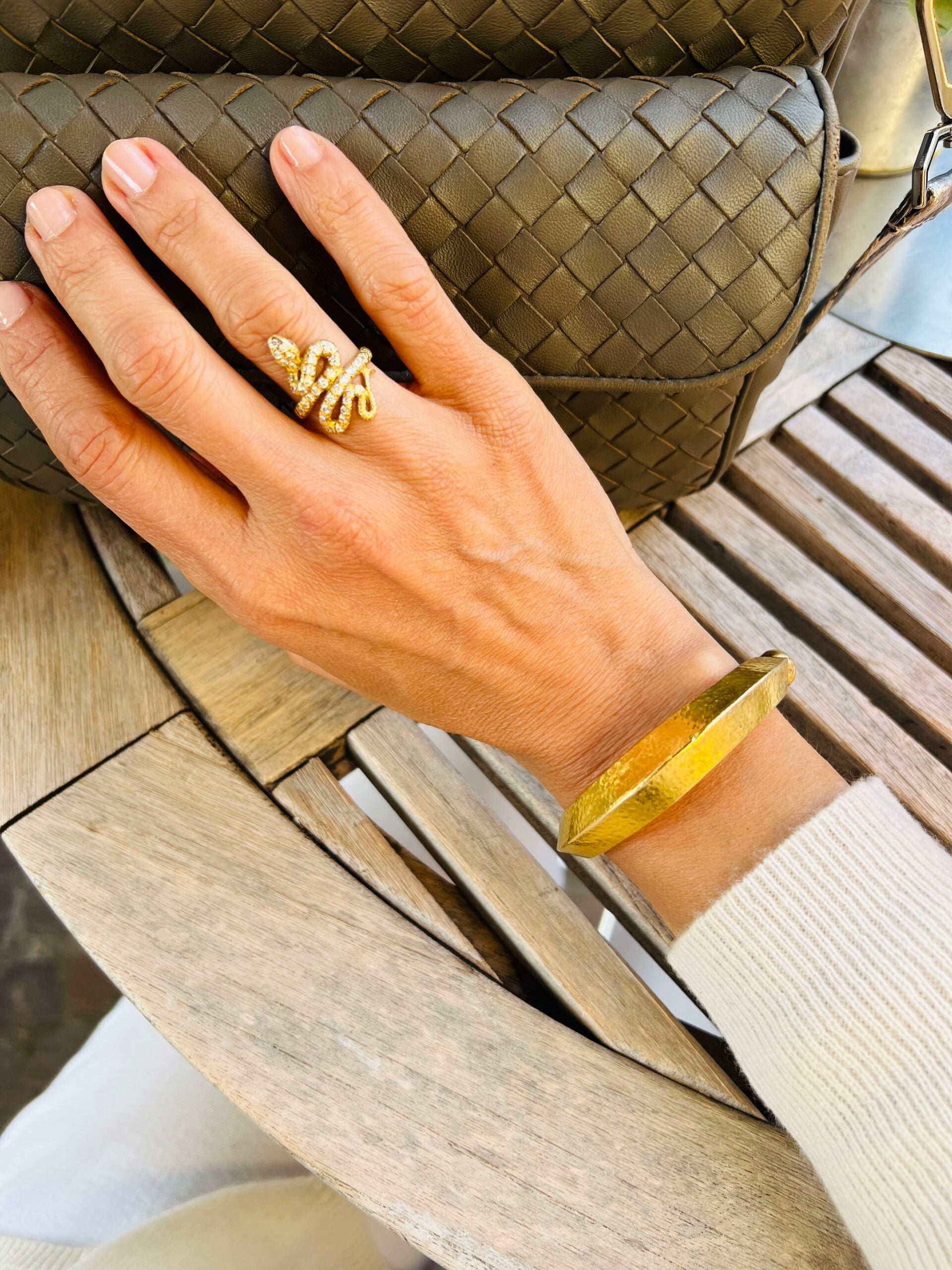 22k hammered yellow gold bangle bracelet by designer Lalaounis