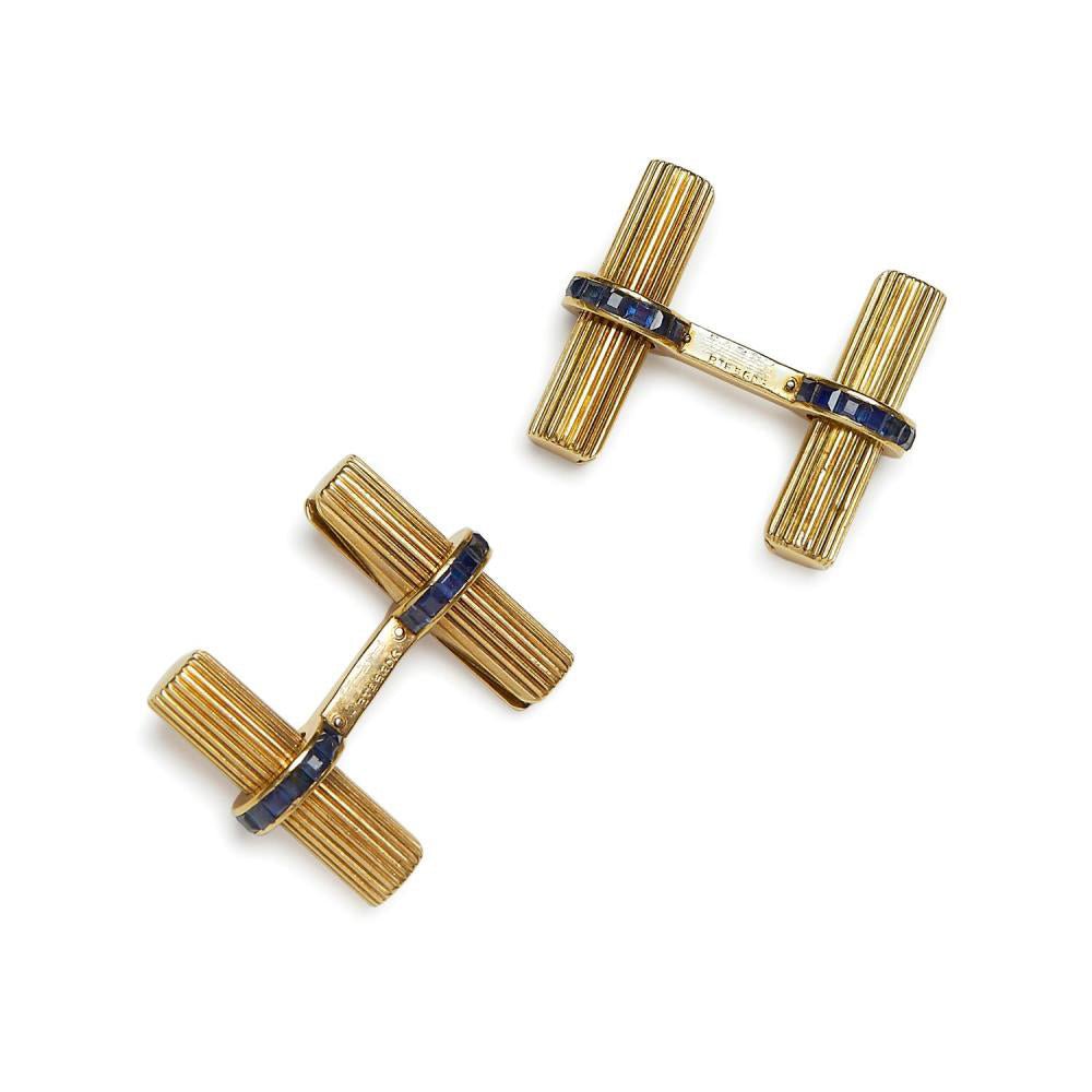 VAN CLEEF & ARPELS Paire de boutons de manchette en or jaune et saphirs calibrés. - Maison Eloe