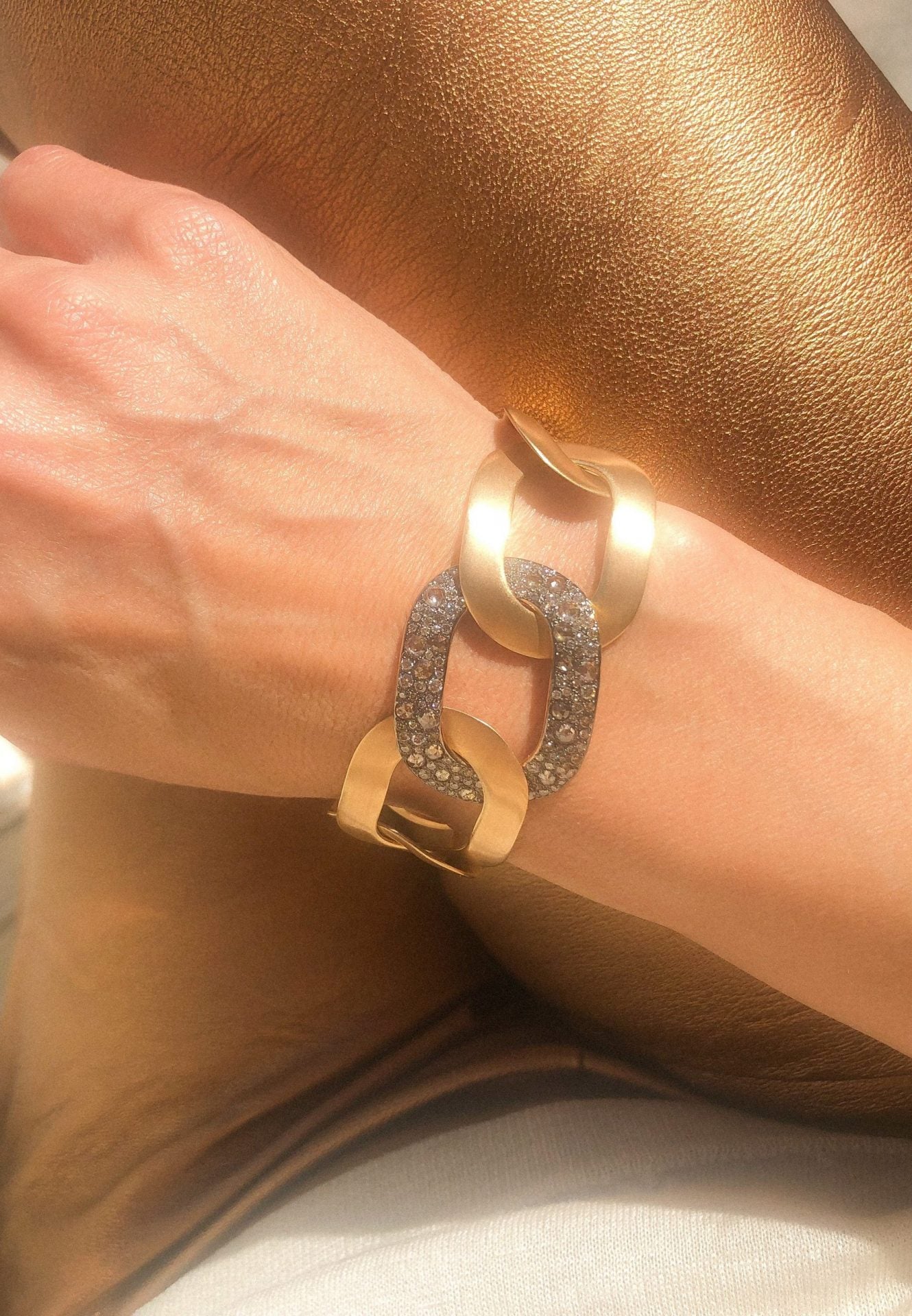 Pomellato, Pink gold bracelet with white and cognac diamonds from the house of Pomellato