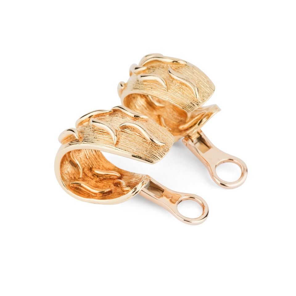 A pair of Kutchinsky clip-on earrings in 18K yellow gold