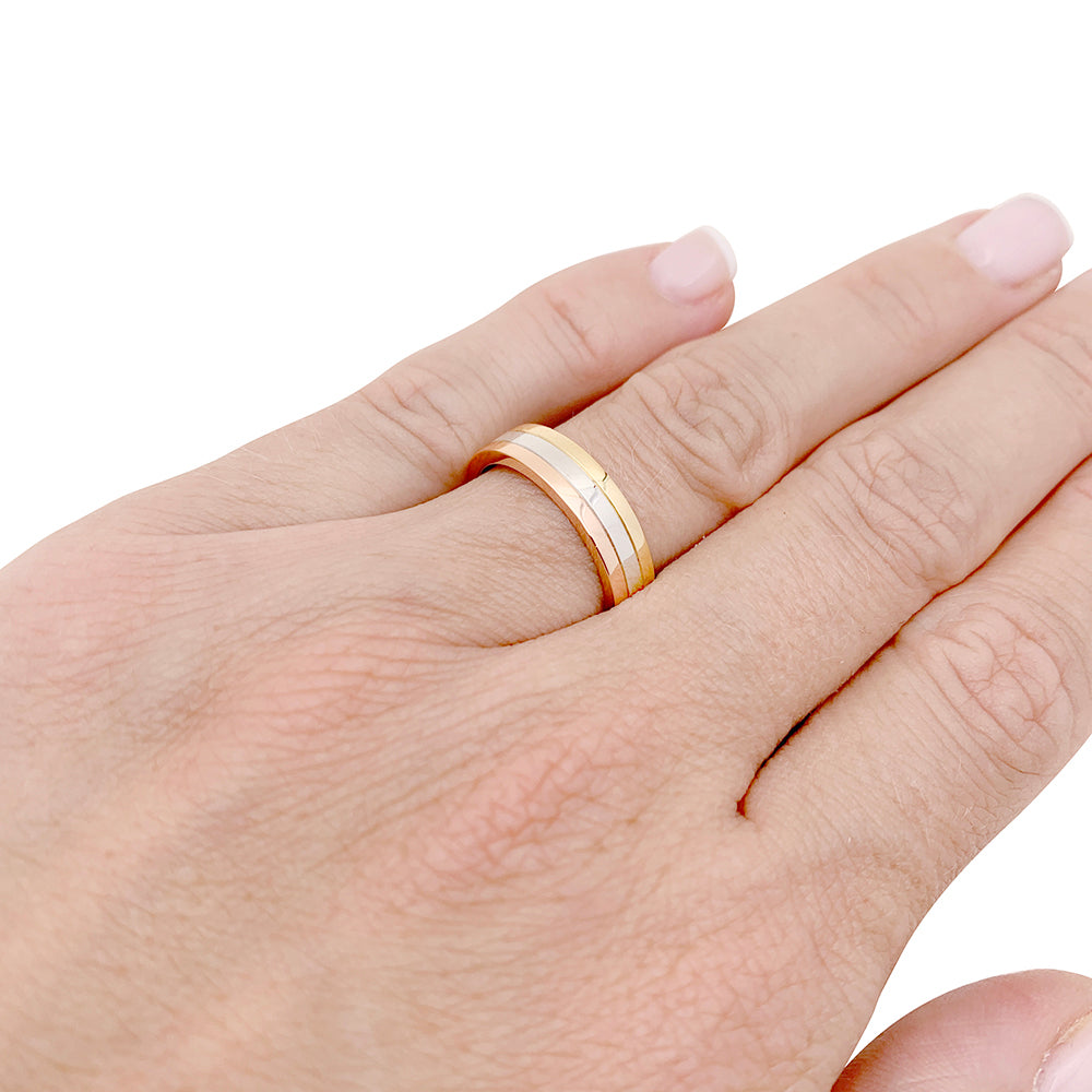 Cartier "Vendôme Louis Cartier" wedding band, three golds.