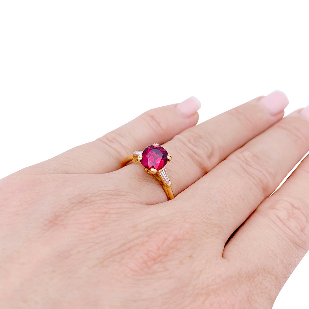 Bague Boucheron or jaune, diamants et rubis.