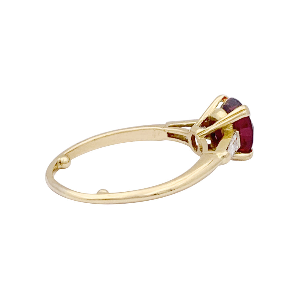 Bague Boucheron or jaune, diamants et rubis.