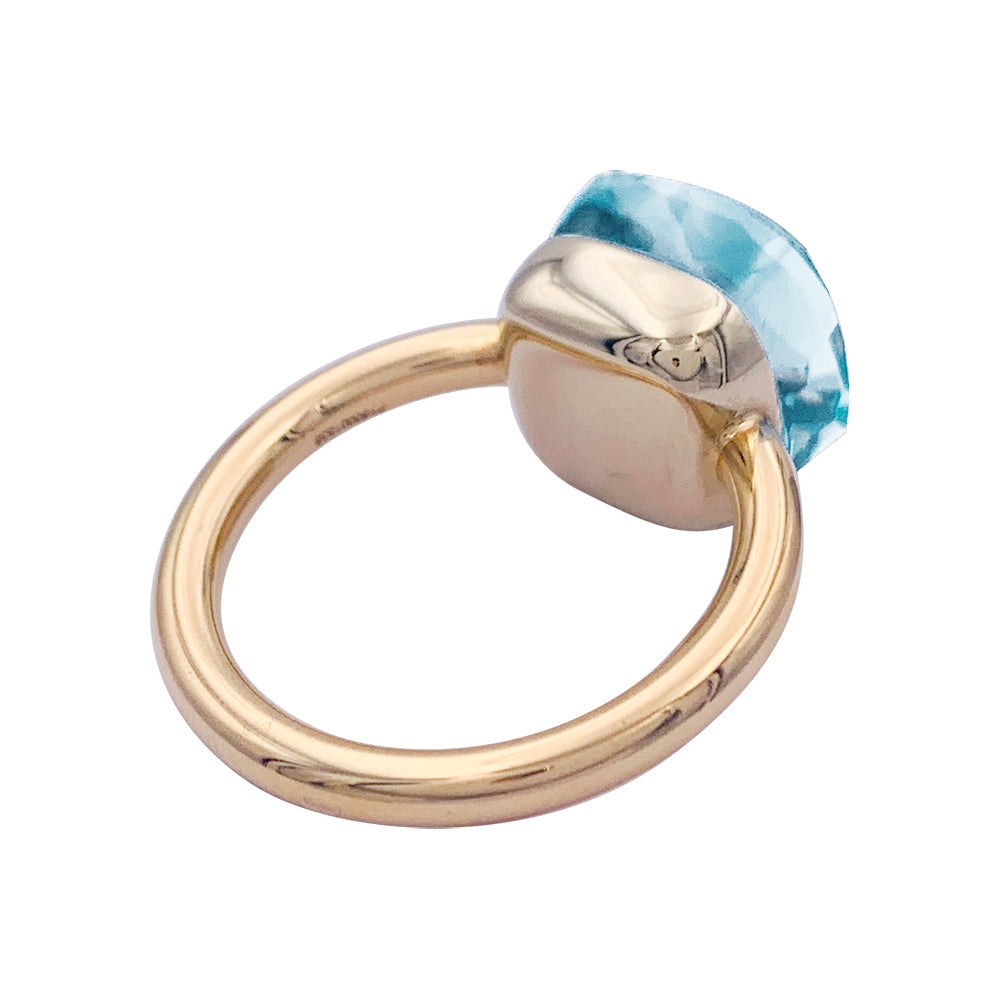 Pomellato ring, "Nudo Maxi", two golds and blue topaz.