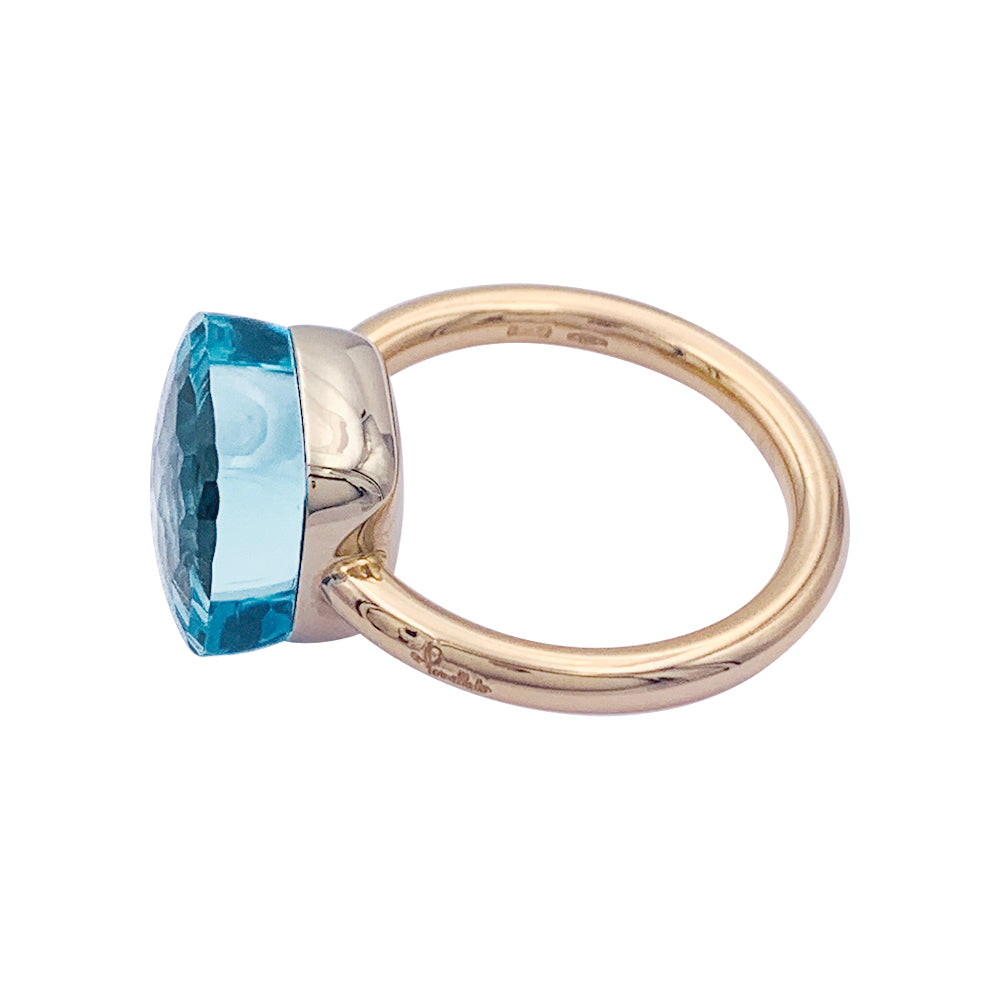 Pomellato ring, "Nudo Maxi", two golds and blue topaz.