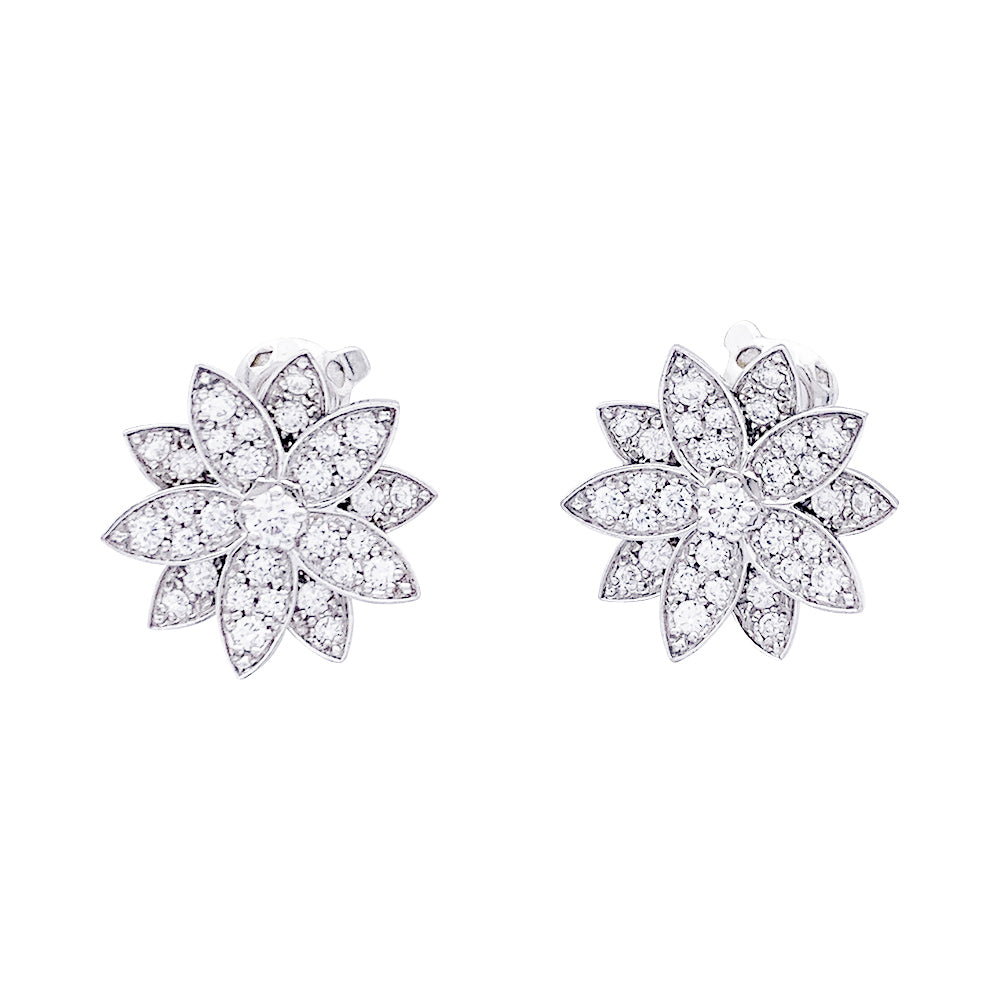Van Cleef &amp; Arpels "Lotus" earrings in white gold and diamonds.