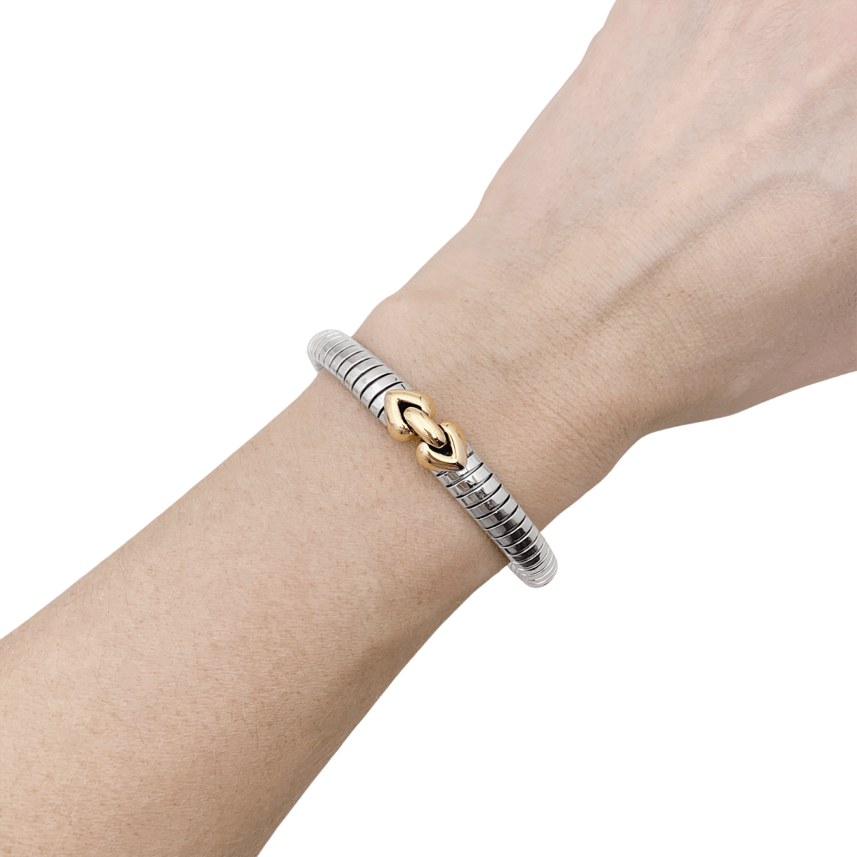Bracelet Bulgari, "Doppio Cuore", or et acier. - Maison Eloe