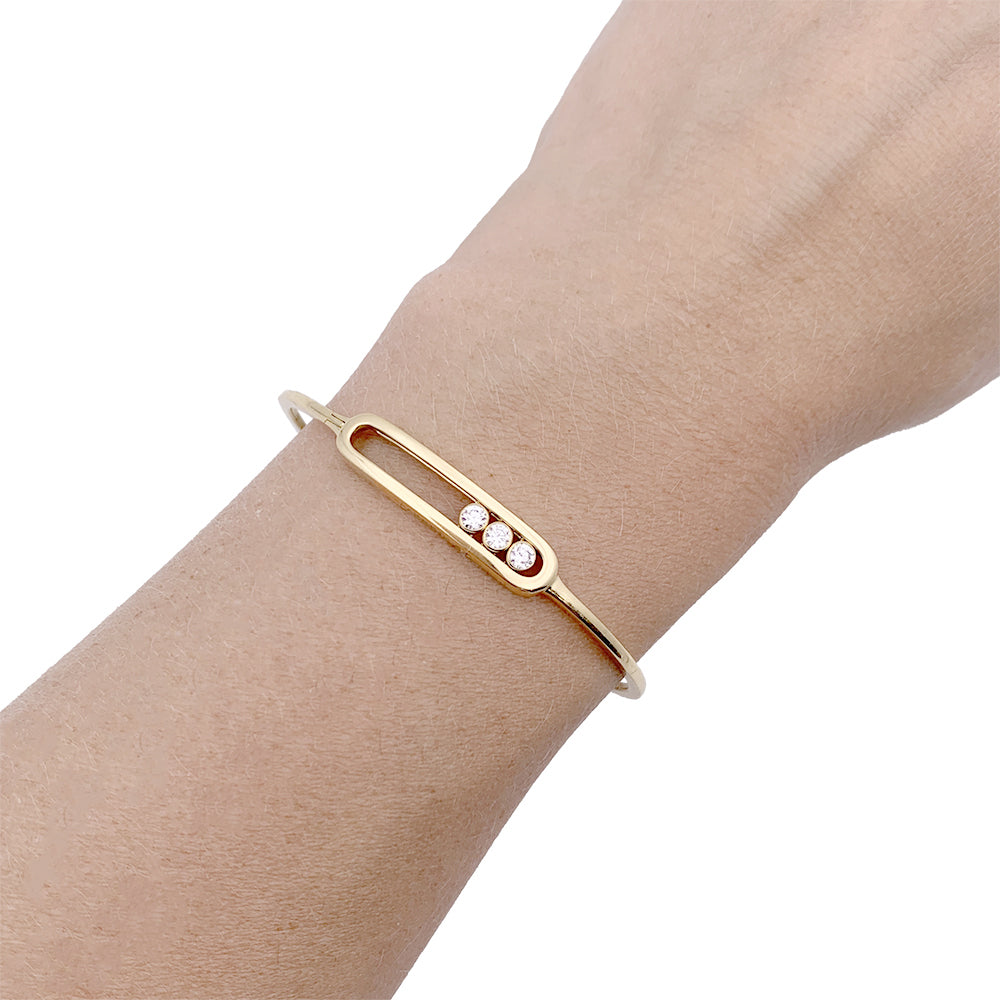 Messika bracelet, “Jonc Move”, yellow gold, diamonds.