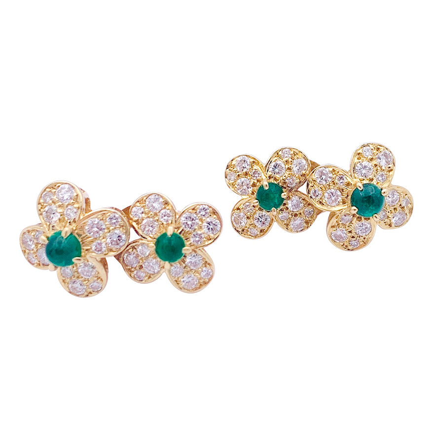 Van Cleef &amp; Arpels "Fleurette" clips in yellow gold, diamonds and emeralds.