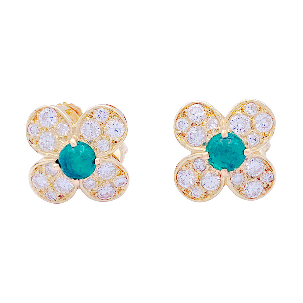 Van Cleef &amp; Arpels "Fleurette" clips in yellow gold, diamonds and emeralds.