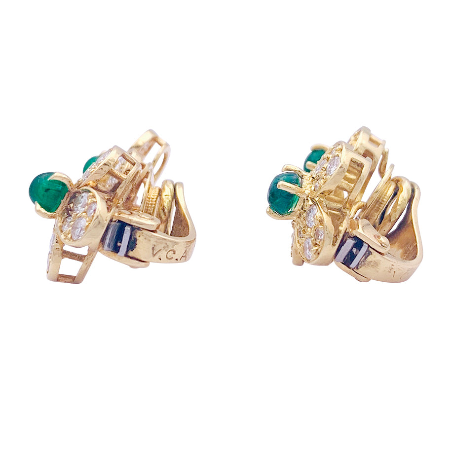 Van Cleef &amp; Arpels "Fleurette" clips in yellow gold, diamonds and emeralds.