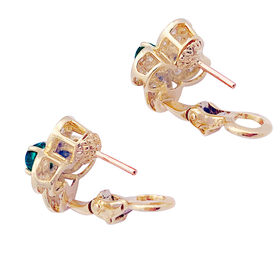 Van Cleef &amp; Arpels "Fleurette" clips in yellow gold, diamonds and emeralds.