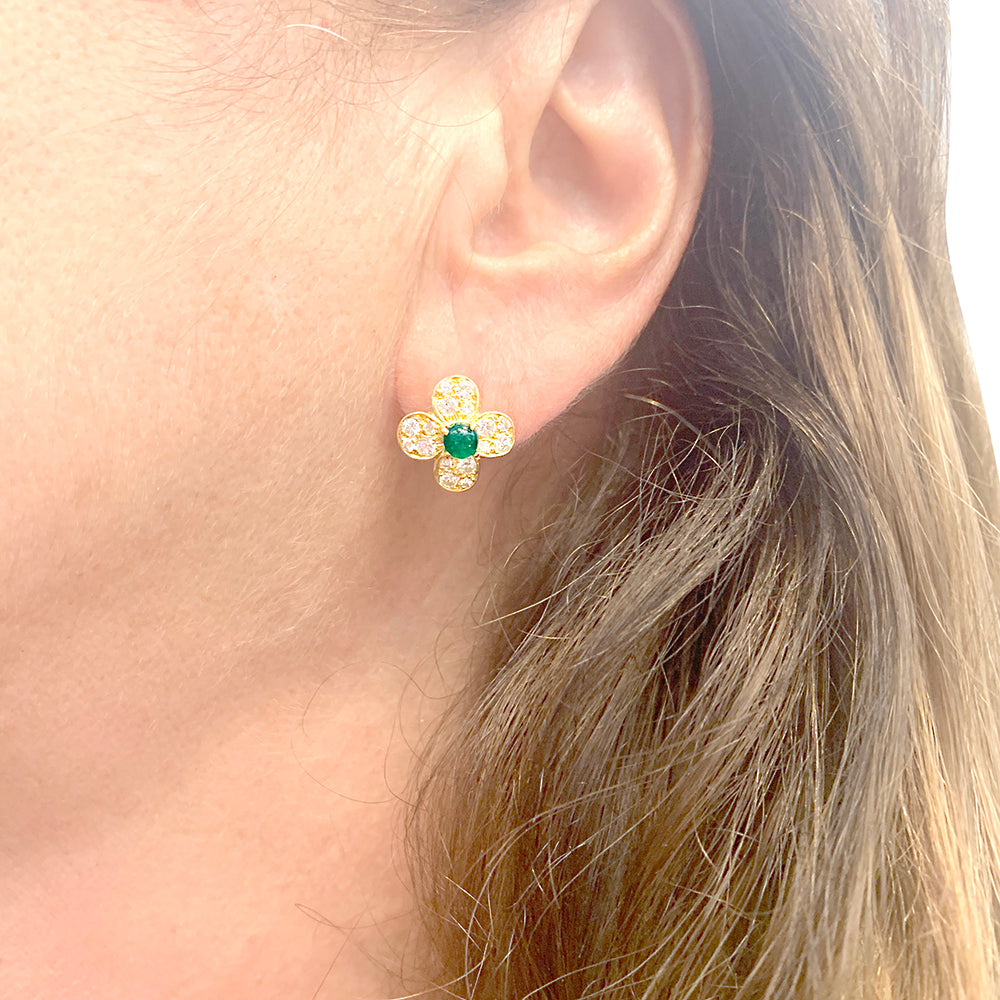 Van Cleef &amp; Arpels "Fleurette" clips in yellow gold, diamonds and emeralds.