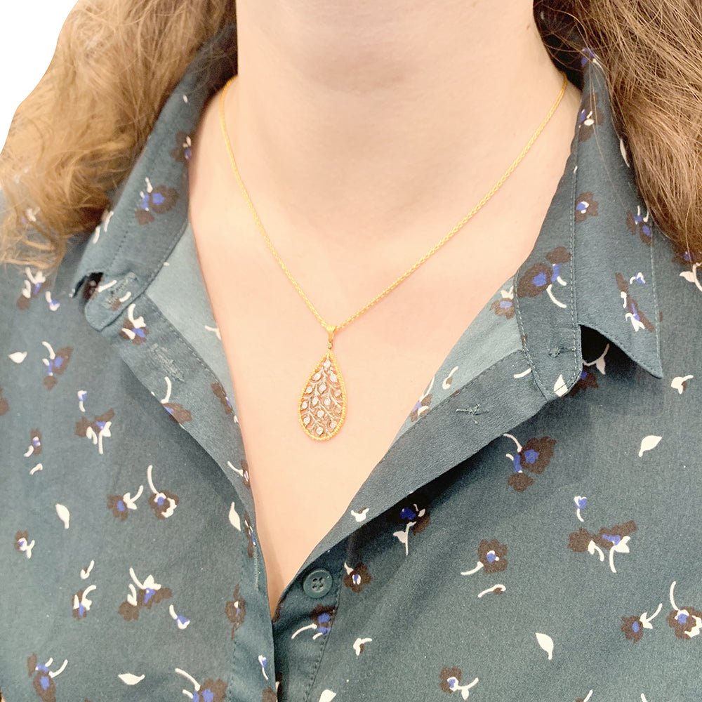 Buccellati "Ramage" necklace in two golds and diamonds.