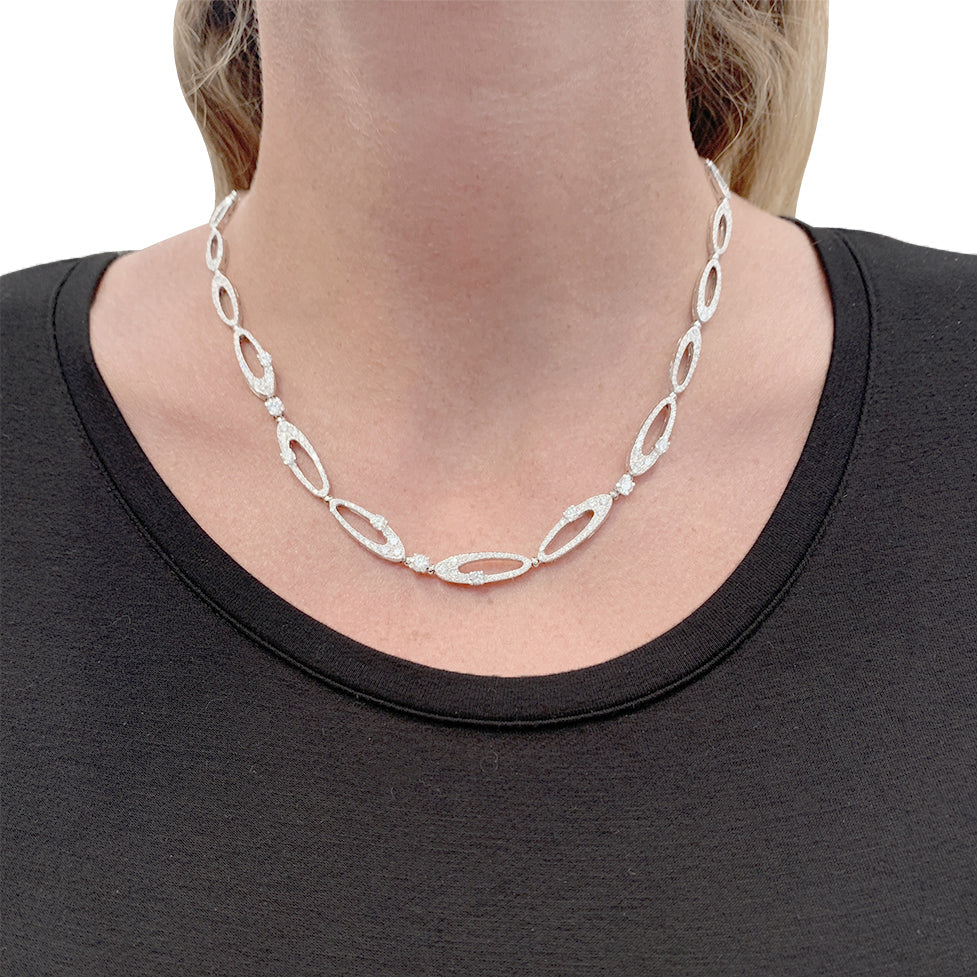 Bulgari "Elisia" necklace, white gold and diamonds.