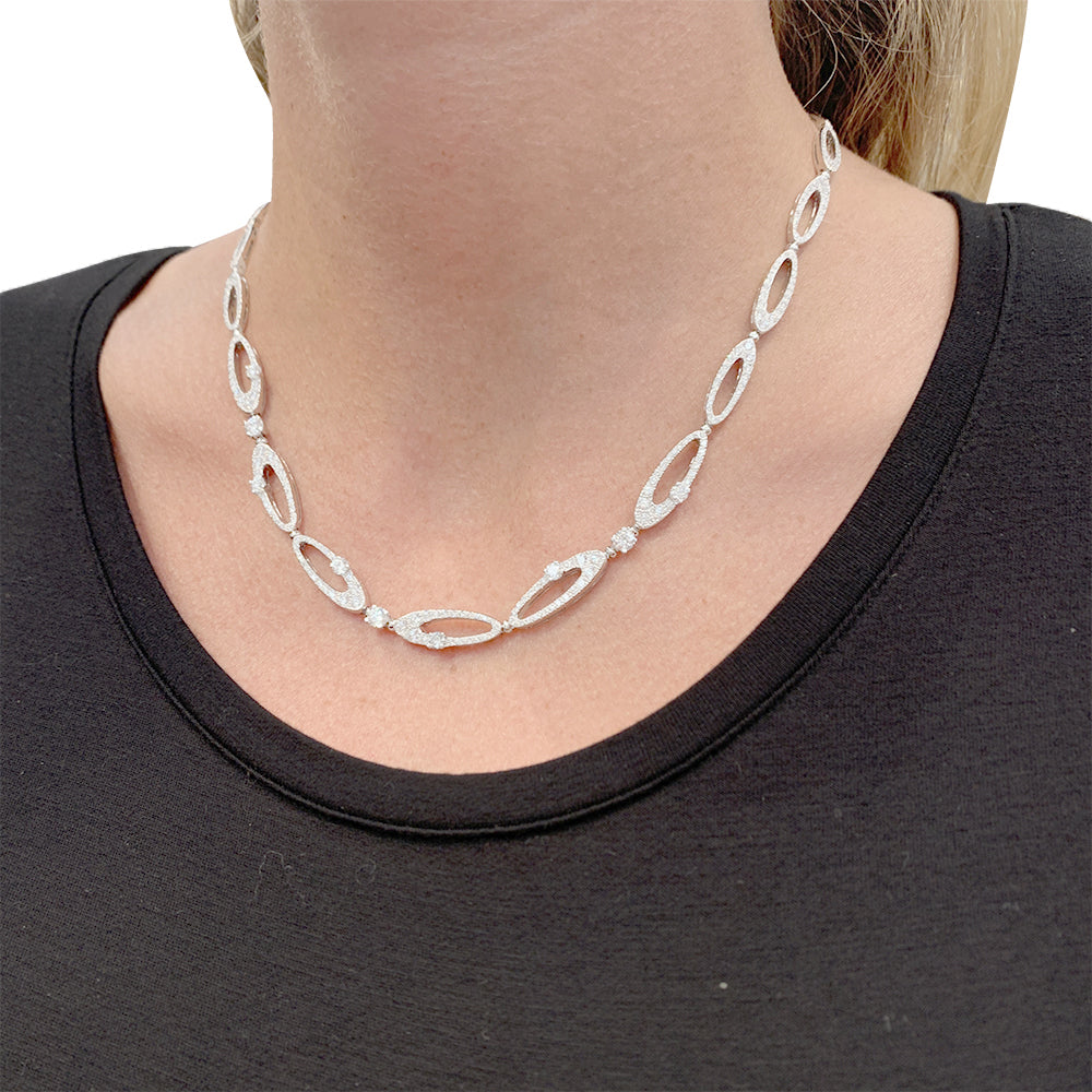 Bulgari "Elisia" necklace, white gold and diamonds.