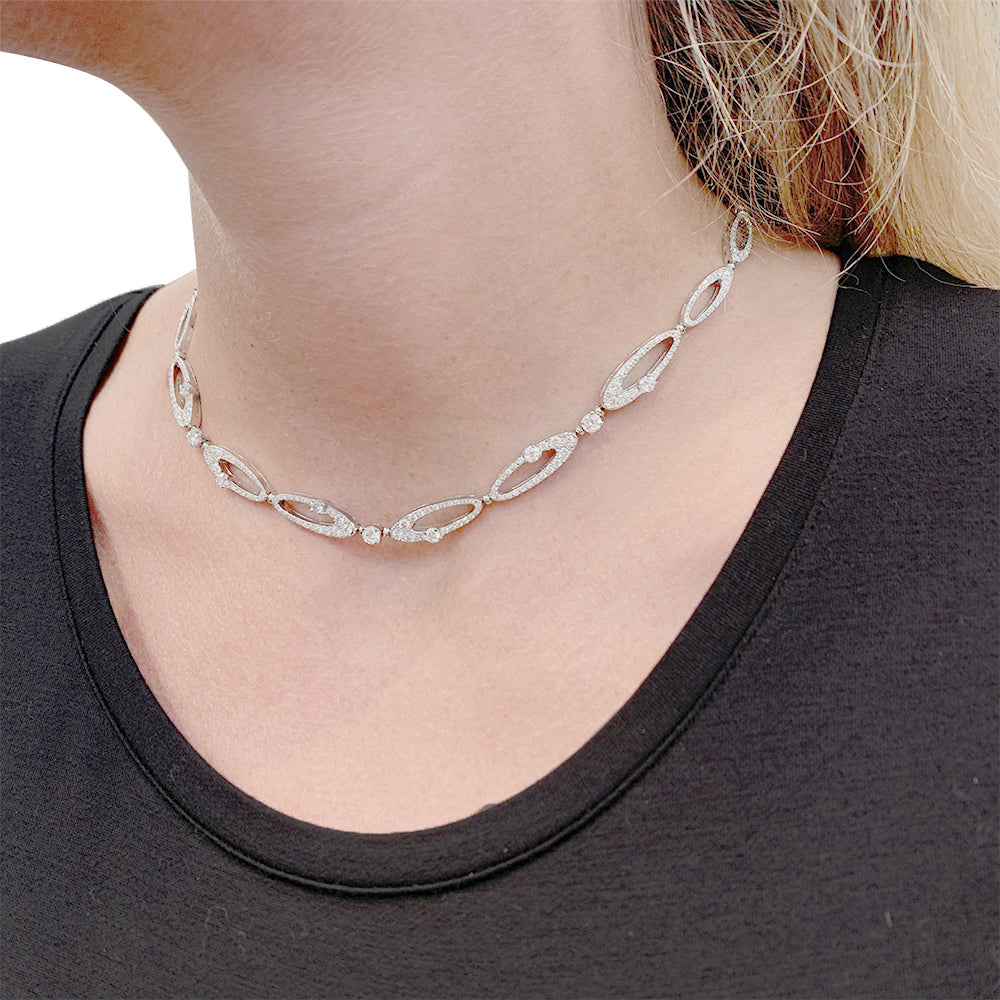Bulgari "Elisia" necklace, white gold and diamonds.