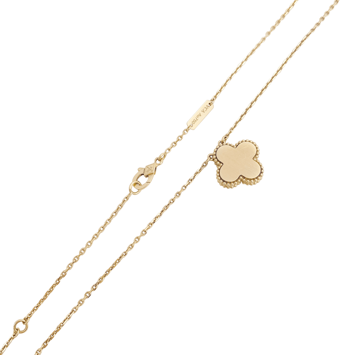 Collier Van Cleef & Arpels "Alhambra" or jaune, porcelaine, diamant. - Maison Eloe