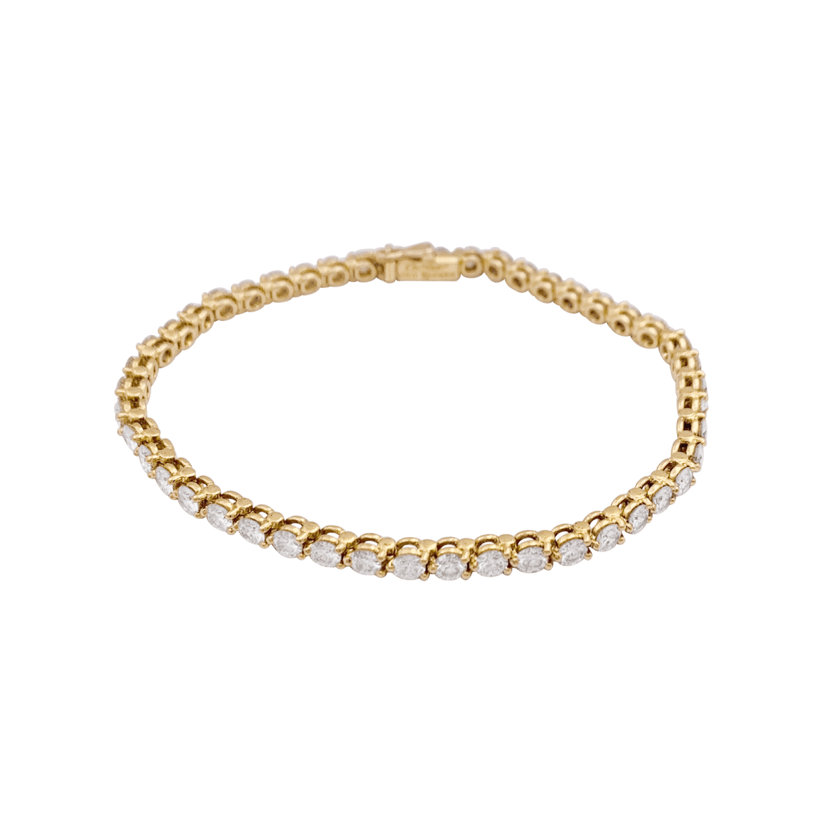Bracelet Ligne tennis Cartier or jaune, diamants. - Maison Eloe