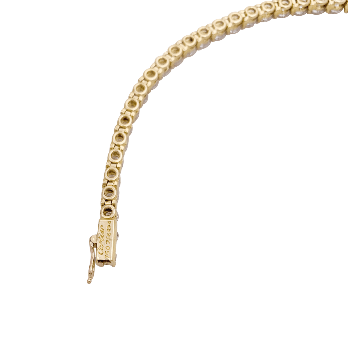 Bracelet Ligne tennis Cartier or jaune, diamants. - Maison Eloe