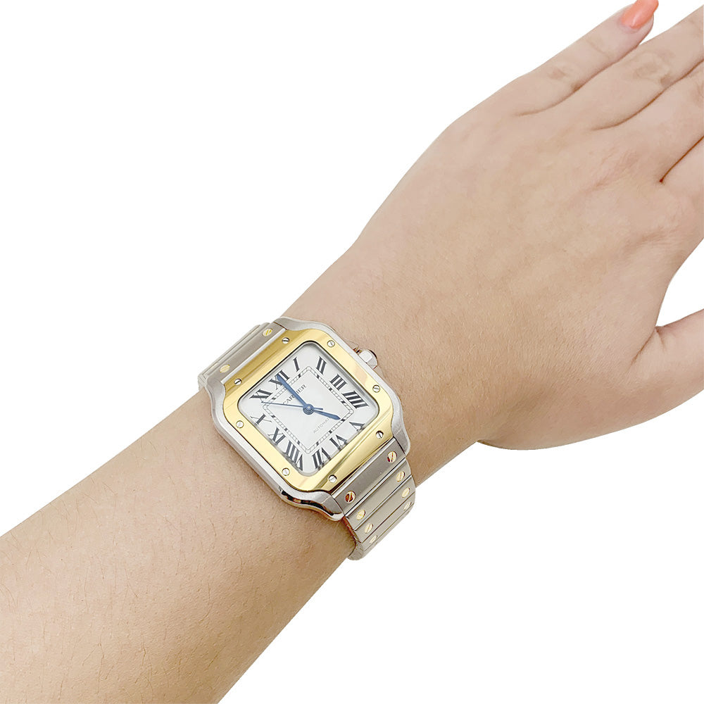 Cartier "Santos" watch, gold and steel.