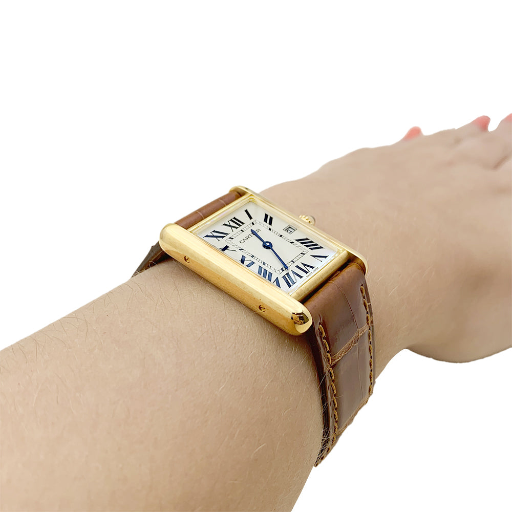 Cartier "Tank Louis Cartier" watch, yellow gold, leather.