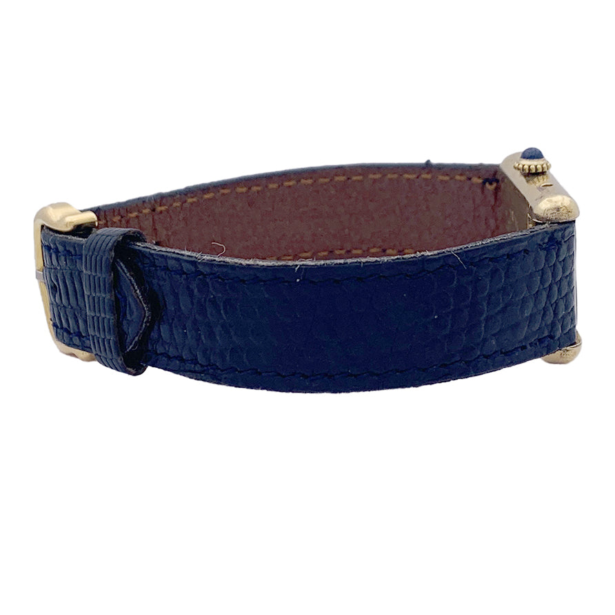 Cartier "Tank Must" watch, gold-plated silver, blue lacquered dial.