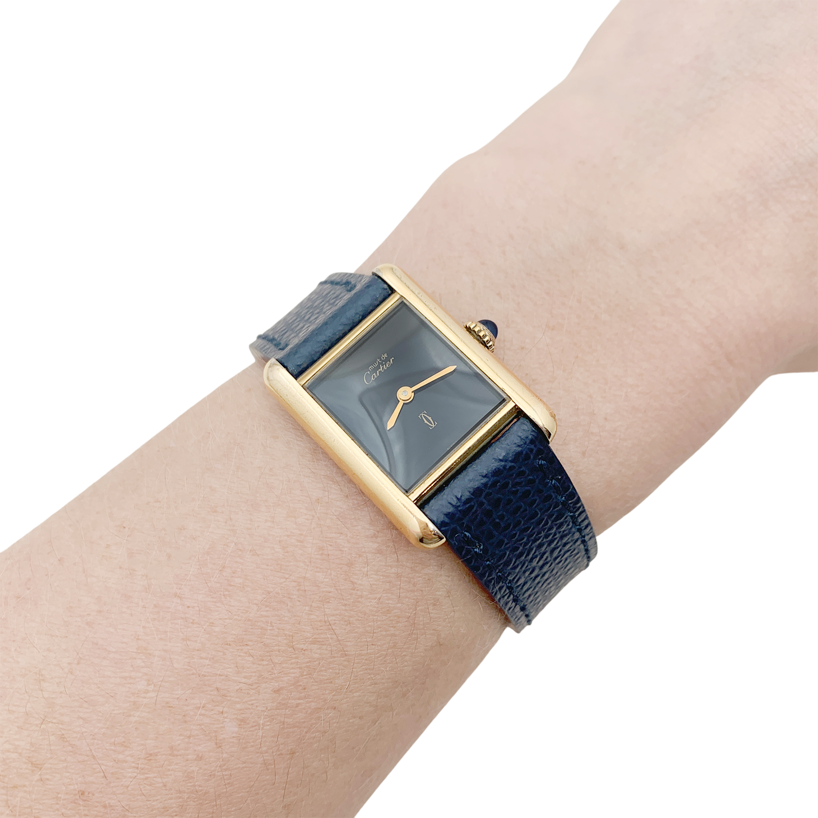 Cartier watch, "Tank Must", gold-plated silver, black lacquered dial.