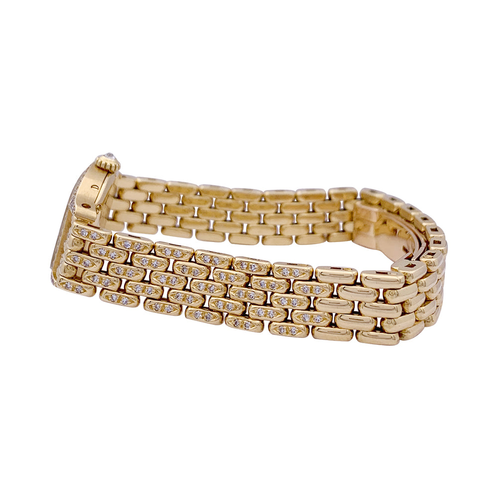 Cartier "Turtle" watch in yellow gold, diamonds, mother-of-pearl.