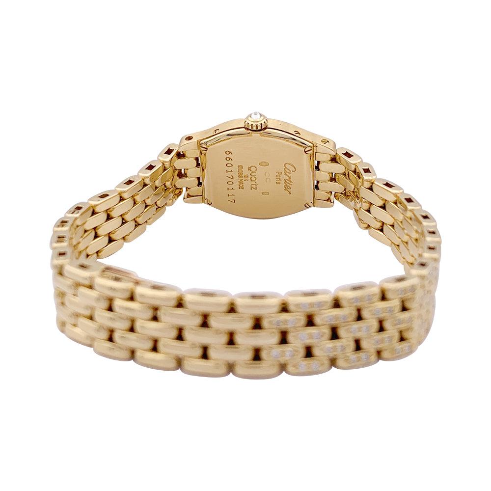 Cartier "Turtle" watch in yellow gold, diamonds, mother-of-pearl.