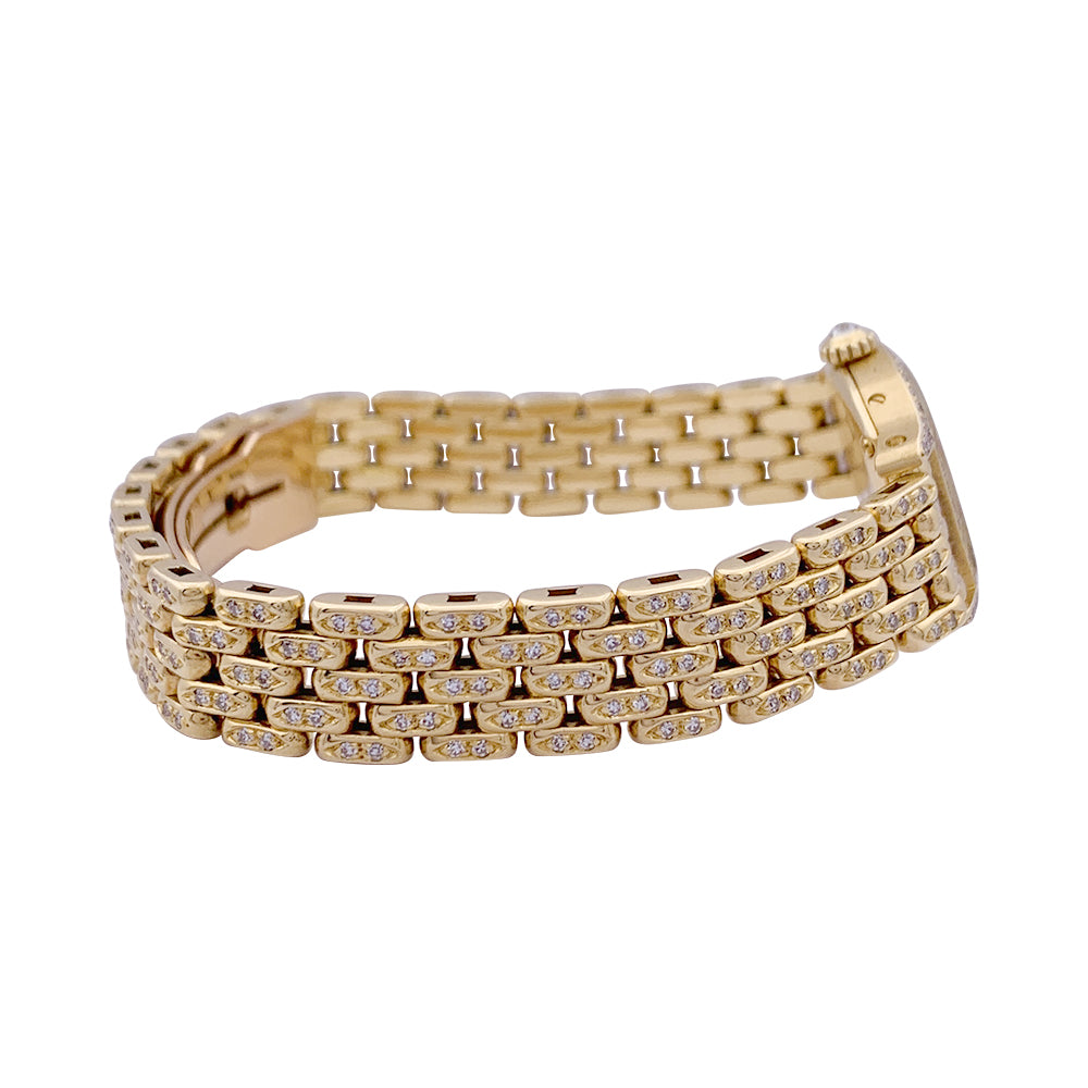 Cartier "Turtle" watch in yellow gold, diamonds, mother-of-pearl.