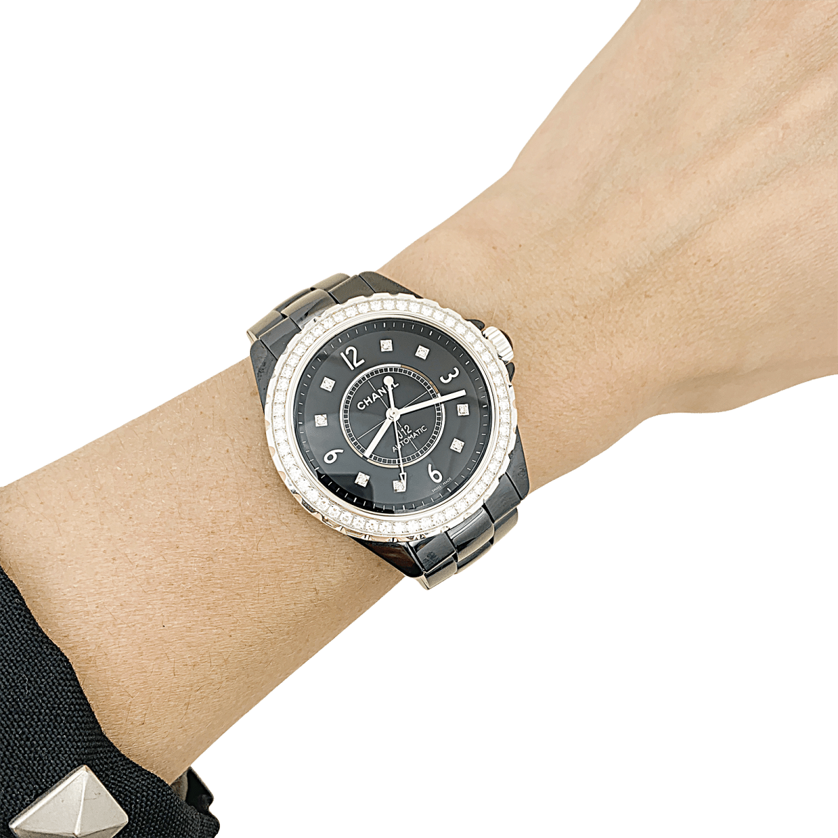 Montre Chanel, "J12", céramique noire, diamants. - Maison Eloe