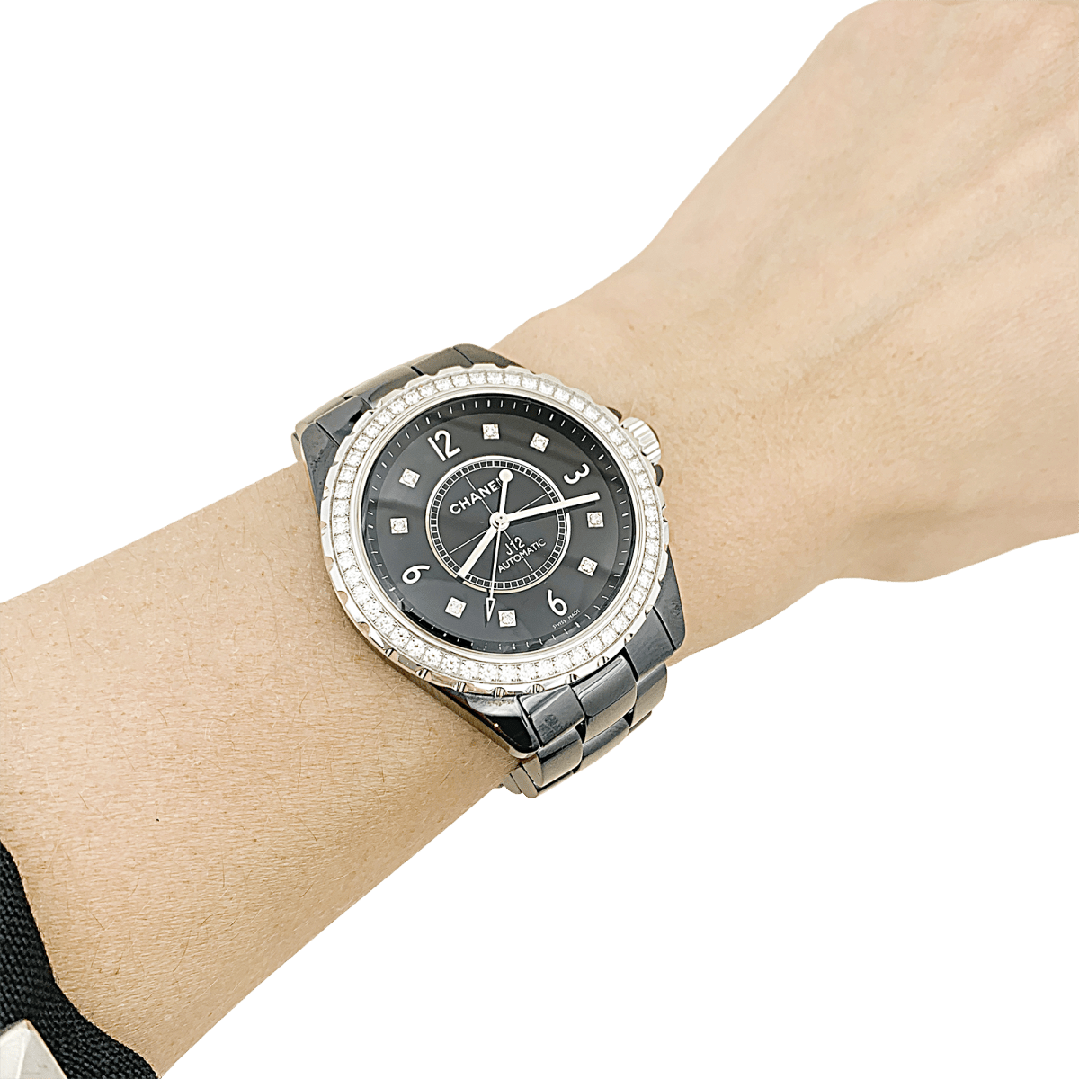 Montre Chanel, "J12", céramique noire, diamants. - Maison Eloe