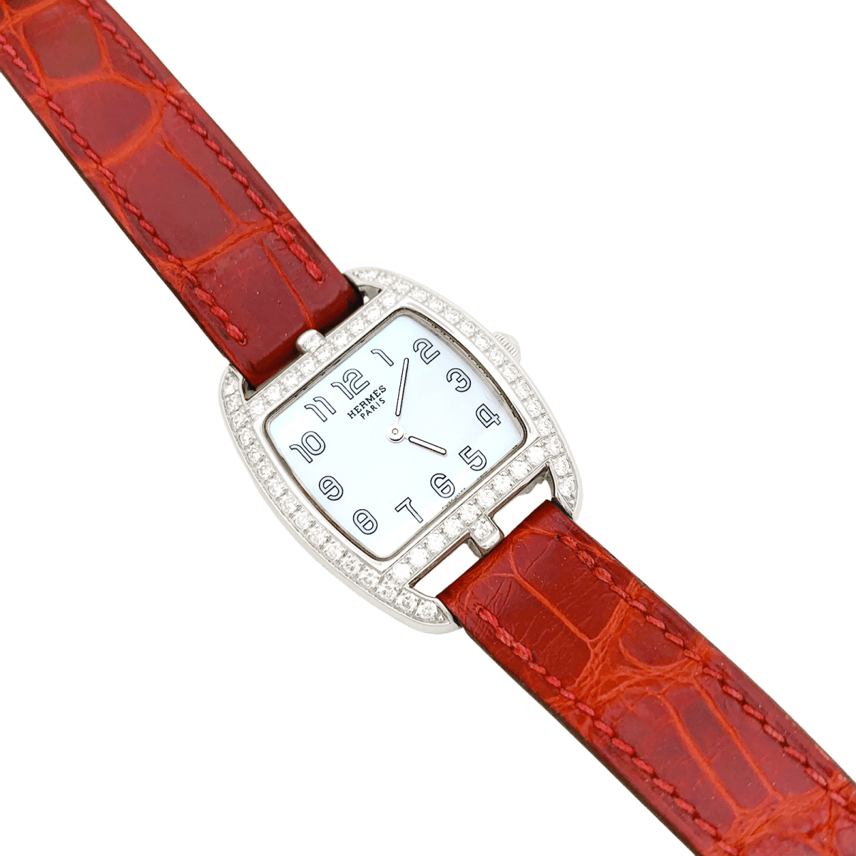 Montre Hermès modèle "Cape Cod Tonneau" en acier et diamants sur cuir. - Maison Eloe